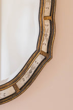 A Decorative Venetian style mirror