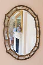 A Decorative Venetian style mirror